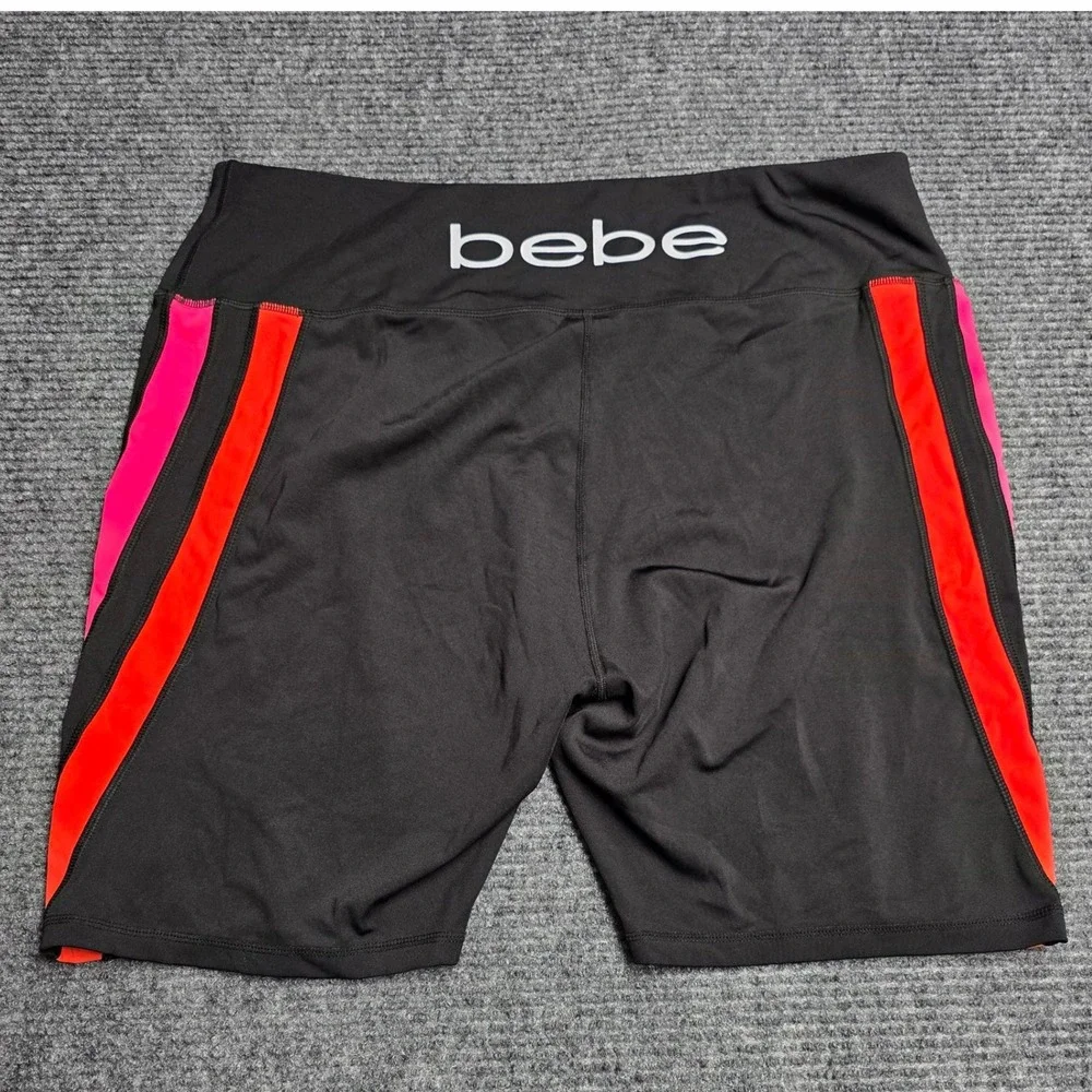 bebe Sport Biker Shorts Women's‎ Size 3X Black Pink Orange Striped Athletic